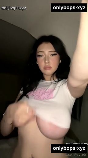 OnlyFans model in white t-shirt