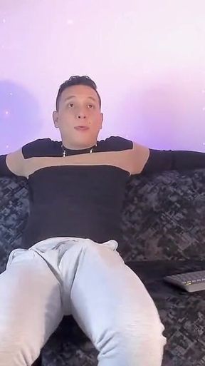 Latino Shows off His Bump on Camera Inside His Gray Sweatshirt