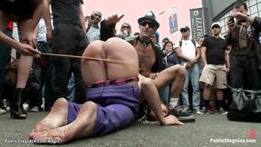 ”Big Titted slave caned on the street”