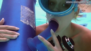 Hungarian beauty fucks dildo underwater