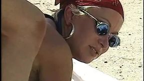 Raunchy cutie gets buck wild on rugged buck's throbbing rod in scorching dunes