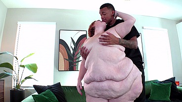 Super Sized Redhead Julie Ginger Sits Her Humongous Ass On A BBC JM1295