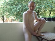 Kudoslong on the balcony undressing naked his cock semi-erect he wanks till erect and gets dressed