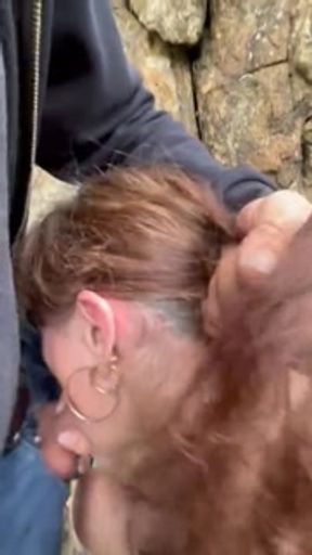 My stepmom gives me a blowjob in the woods