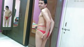 Sexy sissy crossdresser femboy sweet lollipop in a beach cover-up with a sexy pantie inside and flip-flop.