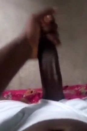 Stroking my hard big black cock.