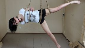 Ballgagged barefoot Ola in white t-shirt and black shorts, suspended sideways with her right leg free and pointed to the floor, is dangling in the air (HD MOV)