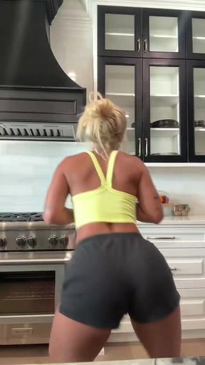 Female Onlyfans Model in Kitchen