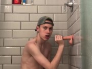 20 year old Jesse Gold wall fucks his dildo until he busts