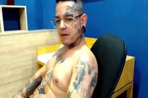 Inked fellow Draining In web cam