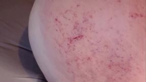 Spanking bad girl'_s large round ass