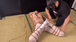 xr132-The girl, bound by duct tape, struggled incessantly, trying to break free