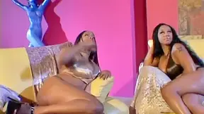 Three ebony whores playing with strapons