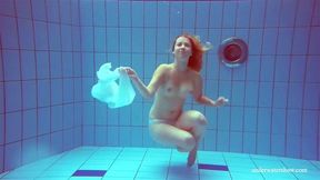 Her graceful movements are unhindered by clothing