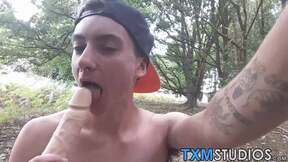 Young FTM prick rider shoves a dildo in his hole outdoors