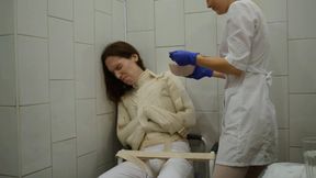 Feeding a patient in a straitjacket