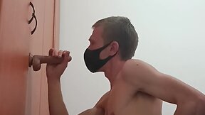 Blonde boy with dildo and mask