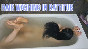 Hair washing in bathtub