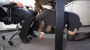 submissive personal assistant under the desk of her boss