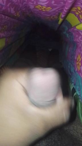 Close up masturbation under the blanket