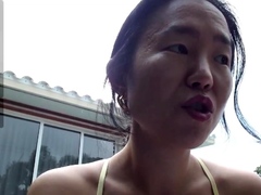Asian enjoys outdoor masturbation