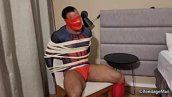 Jerri Gomes struggling and gagged with multiple layers of tape