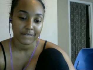 Charming exotic lady plays with her beautiful natural tits