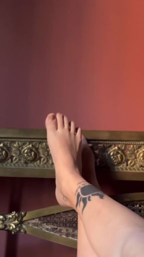 Barefoot on a chair