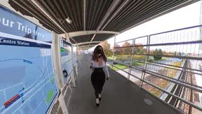 Crossdresser flashing in a train station