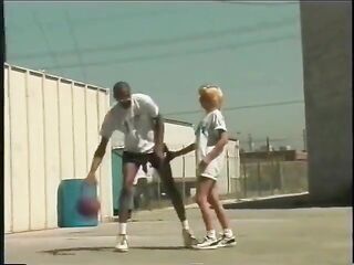 Golden-haired bitch sucks and bangs biggest ebony jock on a rooftop