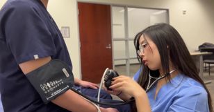 Petite asian nurse pounds on patient's hard dick