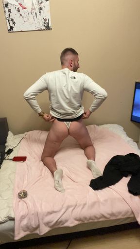In his white sexy thong