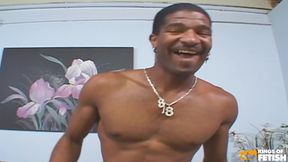Hot babe gets her pussy screwed by a black guy in a porn studio