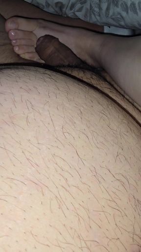 Step mom lets step son fuck her feet while sitting in bed   Clip 1