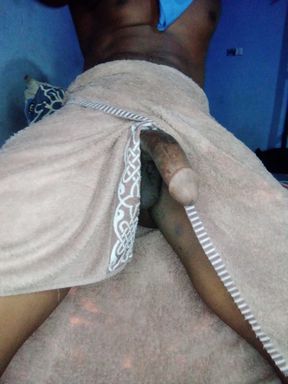 Watch me stroke the biggest black dick in Africa after morning shower