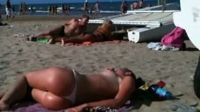 Perfect topless blonde ass on the beach exposing her butt and tits