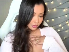 Big boobed Memphis masturbates in a bodystocking