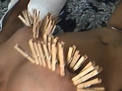 Clothespins on tits