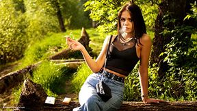 18 years old Tanya is smoking 120mm cork cigarette outdoors