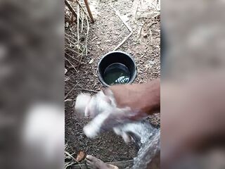 A boy masturbating inside his baths with soap