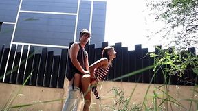 Slender brunette chick makes out with her big cock bf outdoors