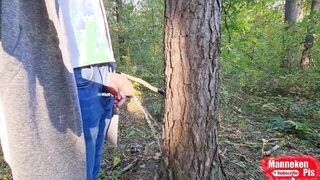 On a walk in the woods, lengthy urinating under a tree
