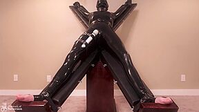 Latex Servitude Floozy Is Made To Have Multiple Orgasms On A Cross