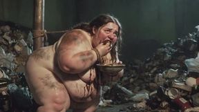 Massive Dirty SSBBW in Bondage Eating from the Trash