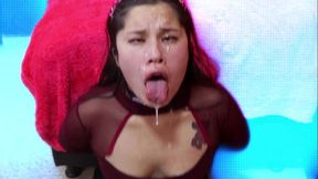 Asian slut plays with cum in mouth