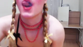 Skinny Latin crossdresser smokes and strips in slutty outfit with toy