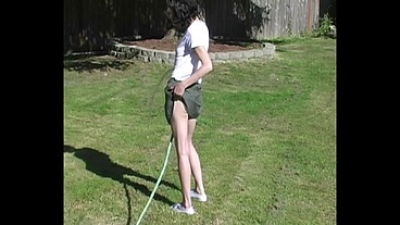 Zoe Plays with Water Hose Wetting Pierced Tits & Her Pussy