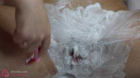 Extreme close-up of hairy pussy shaving!