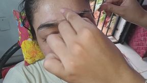 Eyebrow shaping.