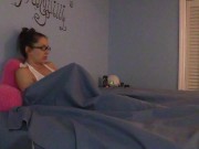 Shy nerdy girl masturbates under the sheets in pajamas